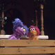 Israeli Muppet Daffy, left, visits Palestinian Muppet Haneen on the set of a Palestinian street during the taping of a joint Israeli-Palestinian production of Sesame Street in 1997.